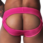 Fuchsia-colored jockstrap made of textured fabric, featuring a wide, open-back cutout design.