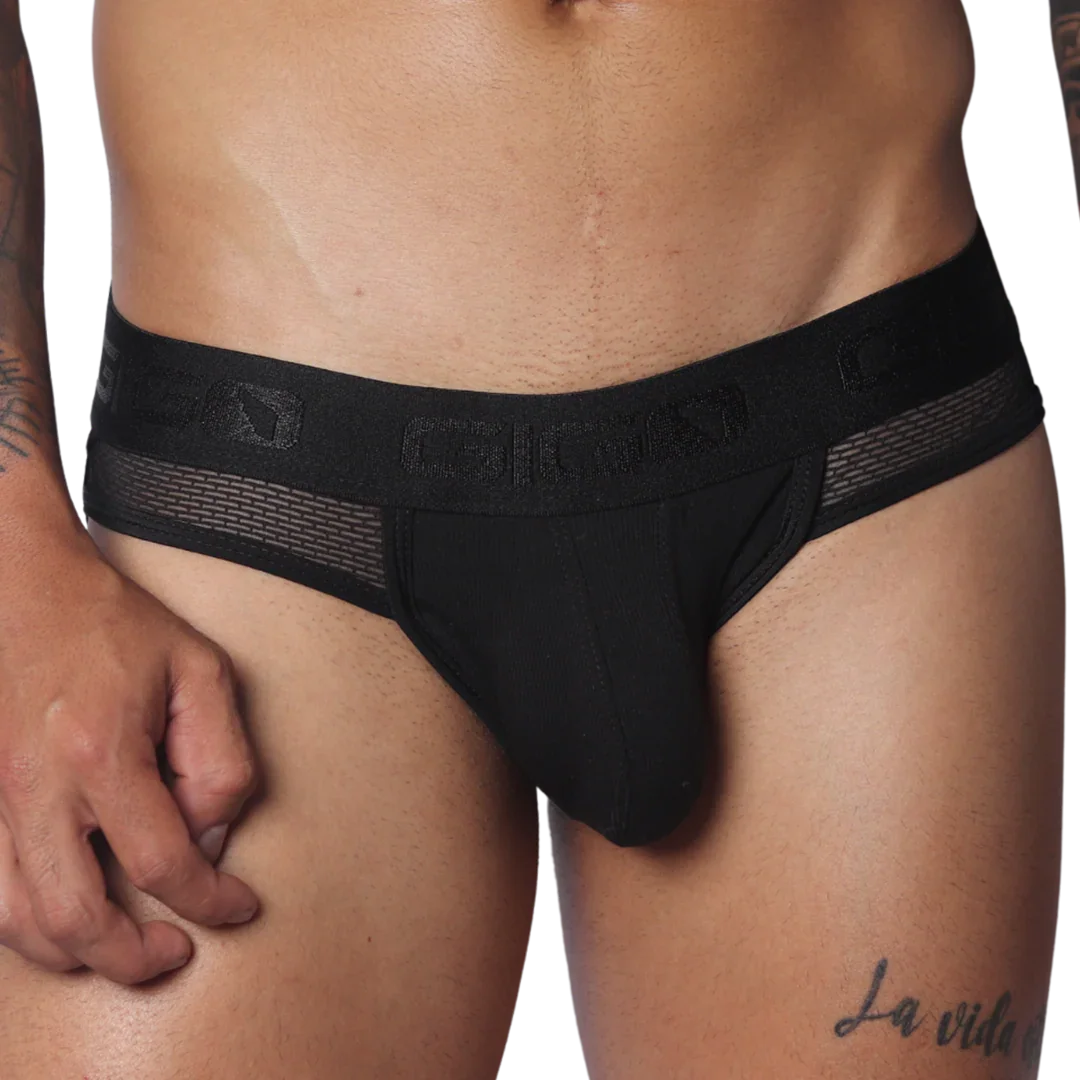 Black jockstrap with a branded elastic waistband, sheer mesh side panels, and a contour pouch.
