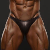 Black shiny leather thong from metromalewear posingwear chocolate posing suit shown from the back side