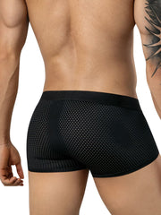 Rear view of a man wearing black mesh trunks with a solid waistband.