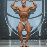 Shiny silver patterned competition briefs with number 34 from metromalewear posingwear dog tag posing suit