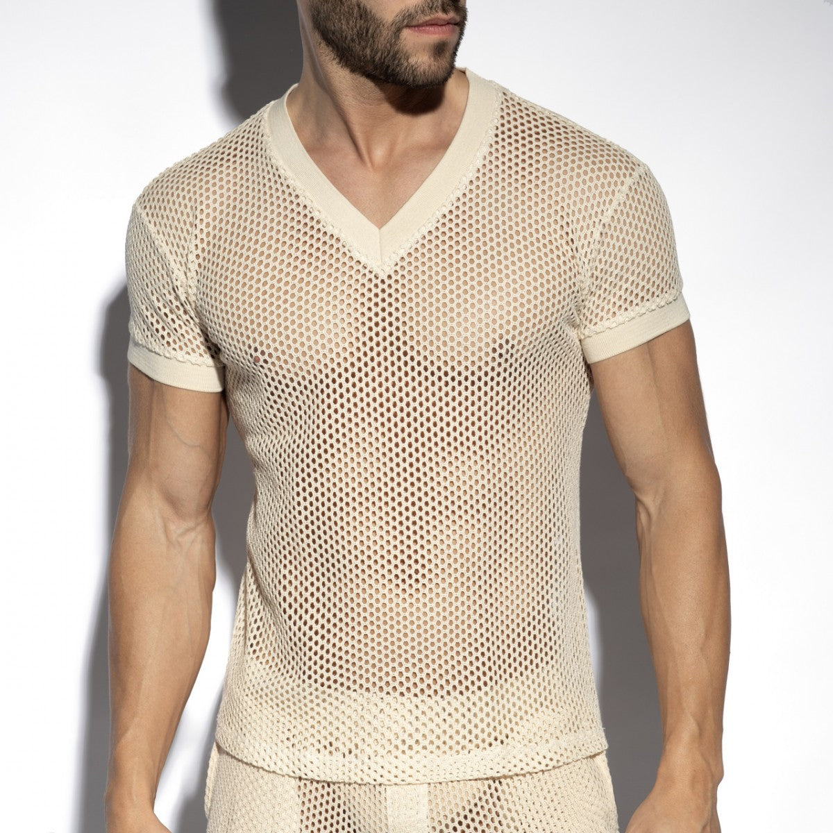 Beige raw crochet t-shirt with mesh v-neck and short sleeves featuring solid trim for casual wear
