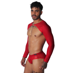 Red mesh long-sleeve harness with a center metal ring and matching red mesh briefs on a shirtless man.