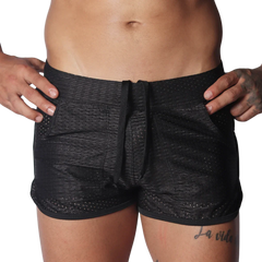 Black athletic mesh shorts with a drawstring waistband and side pockets.