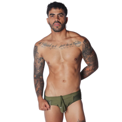 Olive green swim brief with side mesh panels and a center front drawstring tie against a black background.