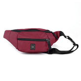 Maroon Westend fanny pack with a black zipper, strap, and a square logo on the front pocket against a white background.