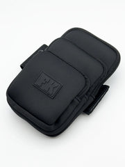 Black fk-branded neoprene wristlet with three zippered compartments and a sleek minimalist design for sports use