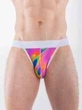 Torso view of a model wearing Full Kit Gear FK Sport psychedelic print jock underwear with a white elastic waistband.