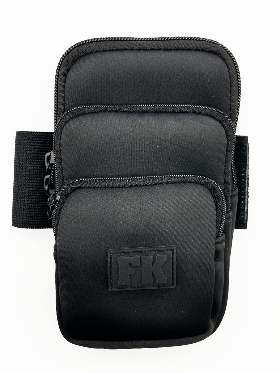 Black fk sport neoprene armband with three zippered pockets and textured fabric finish for secure storage