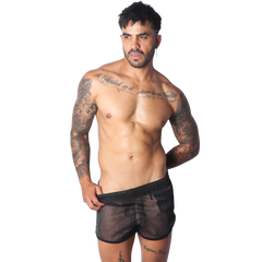 Sheer, black glittery short shorts with a fitted, athletic style.