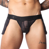 Black metallic shimmer mesh Gigo skirt with a wide branded elastic waistband and open sides.
