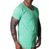 Flash green scoop-neck t-shirt with a metallic, shimmering finish worn by a tattooed man.
