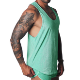 Flash green, metallic-finish racerback tank top with deep-cut armholes, worn by a muscular man.