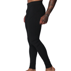 Form-fitting black Lycra leggings featuring a high-rise waistband and minimalist athletic design.