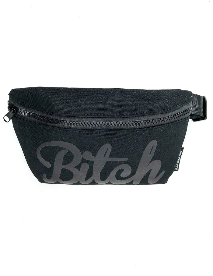 Werds ultra slim fanny pack black canvas with gray cursive bitch logo and black zipper for hands free carry