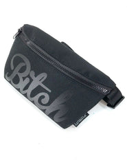 Black fabric WERDS ultra slim fanny pack with gray cursive bitch graphic and zipper closure for hands free use