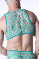 Man wearing a turquoise galaxy mesh cropped tank top from behind.