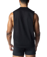 A man's back view, wearing a plain black Nasty Pig tank top and matching shorts, isolated on white.