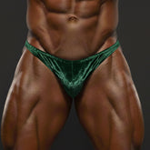 Emerald green velvet thong from metromalewear posingwear designed as a green velvet posing suit back side