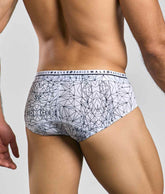 White malebasics new hipster brief spider featuring black geometric lines and a branded waistband