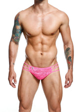 Bright pink lace briefs with playful eye-shaped logo on front from mob men’s lace pouch thong collection