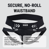 Men’s x jockstrap with black elastic waistband featuring white arrow graphics and mob eroticwear branding visible on back
