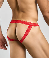 Red lace thong with scalloped edge and intricate pattern featured in mob men’s lace jockstrap product image