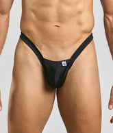 Black mob y buns thong with form-fitting sleek minimalist design and small white brand tag at the front