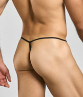 Black thong g-string with thin sleek design showing the back side from MOB Print new collection