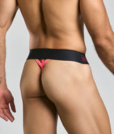 MaleBasics neon thong in black and pink with bold angular design and subtle logo on the waistband front view