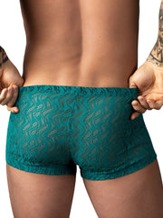 Male Power teal ripple pouch short trunks featuring a sheer, wavy lace pattern on the back.