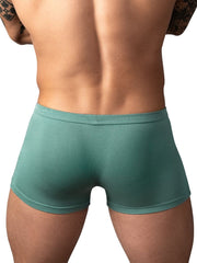 Male Power Eco Cozy Pouch short trunks in solid green. Form-fitting style with a flat waistband and hemmed leg openings.