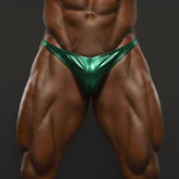Shiny emerald green metallic briefs by metromalewear for posing featuring a sleek reflective finish
