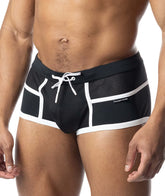 A model wears black and white Nasty Pig square cut swimwear with mesh panels and a white drawstring.