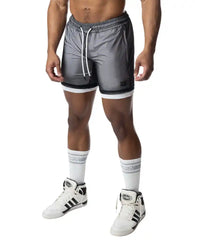 Gray blur rugby short athletic shorts with reflective finish white drawstrings and black trim along the hem