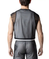 Rear view of a man wearing the Nasty Pig Blur Crop Top in translucent black, paired with matching shorts.