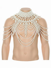 An elaborate white pearl chest piece and choker necklace displayed on a mannequin torso.