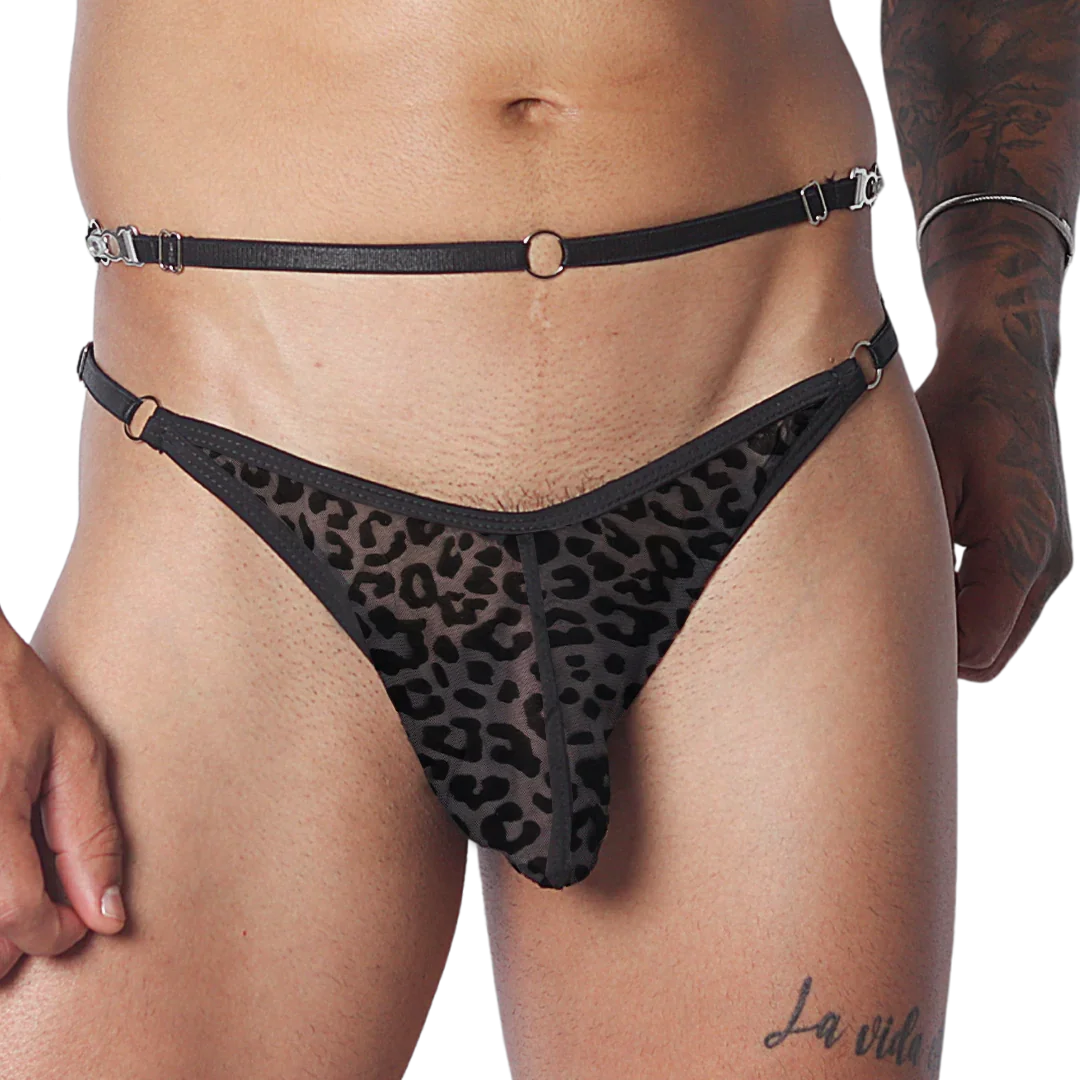 Sheer black leopard-print jockstrap featuring a thin waist belt, metal hardware rings, and adjustable closures.