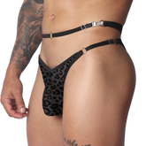 Black leopard-print plush jockstrap featuring thin elastic waist straps, metal rings, and adjustable metal hardware.