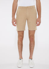 Beige solid stretch knit chino shorts with button closure and belt loops for comfortable casual wear