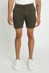 Solid stretch knit olive green chino shorts with classic fit and button closure for comfortable casual wear