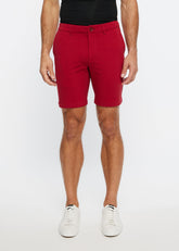 Red men’s chino shorts solid stretch knit short with tailored fit and button closure for casual wear