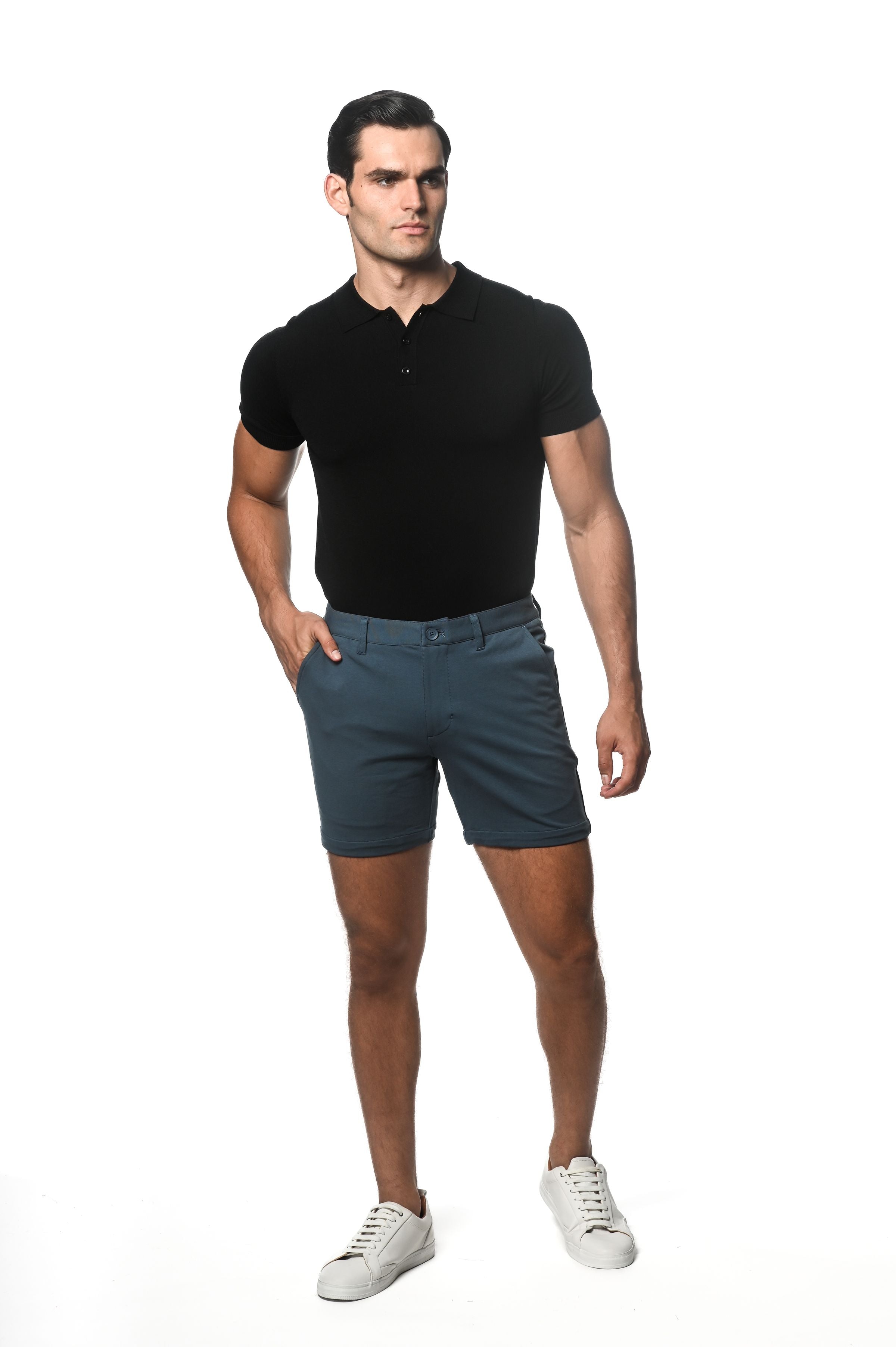 A pair of dark teal textured stretch knit chino shorts with classic fit and belt loops for casual wear