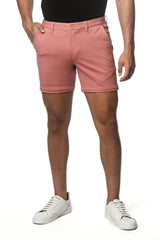 Textured stretch knit chino shorts in crisp pink with button closure and belt loops for casual wear