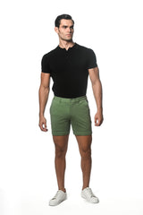 Olive green textured stretch knit chino shorts with classic fit and button closure for casual wear
