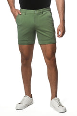 Olive green textured stretch knit chino shorts with button closure and rolled cuffs for casual wear