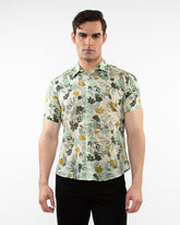 Lightweight cotton silk short-sleeved men’s shirt in light cream with yellow floral pattern and green leaves