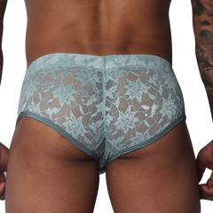 Aqua green lace trunk with floral patterns, featuring a solid trim along the leg openings and waistband.