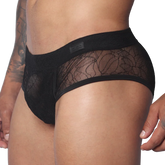 Black men's trunk with floral lace panels, solid waistband featuring a Gigo logo patch, and a contoured pouch design.