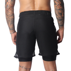 Black athletic shorts featuring a layered design with a loose, wide-gauge mesh outer layer over solid fitted liners.